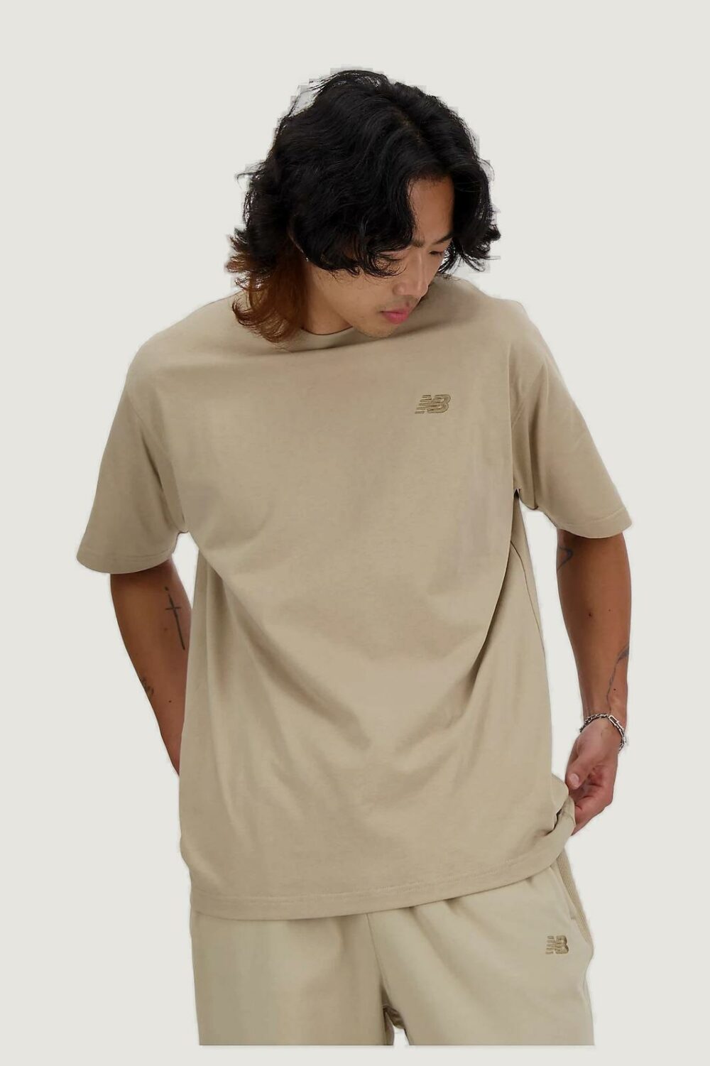 T-shirt New Balance 41533 Beige - Foto 1